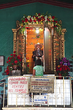 Temple of San Simon, also known as Maximon, Patron Saint of Gamblers and Drunks, San Andres Itzapa, Guatemala, Central America