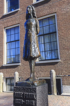 Statue of Anne Frank outside Westerkerk, near her house, Amsterdam, Netherlands, Europe 