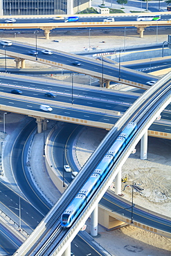 Road interchange and Metro train, Dubai, United Arab Emirates, Middle East