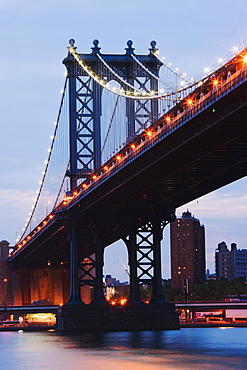 Manhattan Bridge spanning the East River at dusk,New York City, New York, United States of America, North America