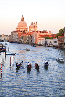 Gondolas on the Grand Canal, view towards the domed church of Santa Maria Della Salute, Venice, UNESCO World Heritage Site, Veneto, Italy, Europe