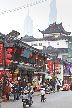 Pedestrians and traffic on Shanghai Old Street, remnant of a bygone age, Fuxing, Shanghai, China, Asia