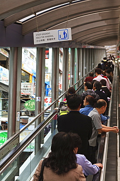 Mid-Levels Escalators, the longest outdoor covered escalator system in the world at 800 metres, linking the Mid-Levels with Central, Hong Kong Island, Hong Kong, China, Asia