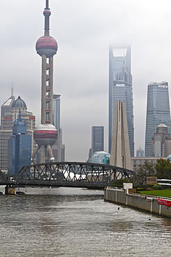 Suzhou Creek and the Waibaidu Bridge with view towards the Pudong skyline, Shanghai, China, Asia