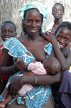 Young mother breast feeding, Ndiobene Talleine, Kaolack, Senegal, West Africa, Africa