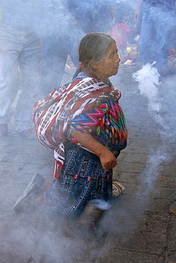 Devotee in St. Thomas church, Chichicastenango, Guatemala, Central America