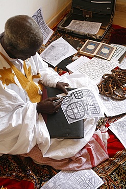 Marabout at work, Mbour, Thies, Senegal, West Africa, Africa