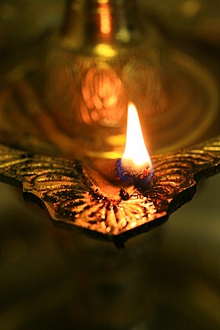 Oil lamp in Hindu temple, Paris, France, Europe