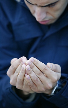 Man praying in the Great Mosque, Lyon, Rhone, France, Europe