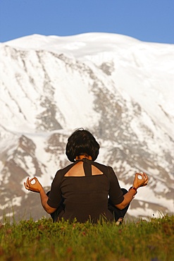 Meditation in front of Mont Blanc, Saint-Gervais, Haute Savoie, France, Europe