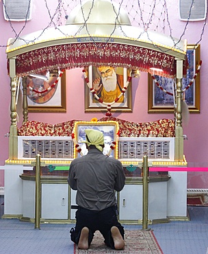 Man praying in Sikh Temple, Dubai, United Arab Emirates, Middle East