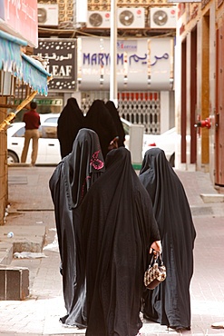 Muslim women wearing abayas, Dubai, United Arab Emirates, Middle East