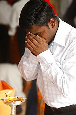 Prayer in Hindu temple, Dubai, United Arab Emirates, Middle East