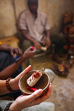 Voodoo ritual with a tourist, Akodessewa fetish market, Lome, Togo, West Africa, Africa