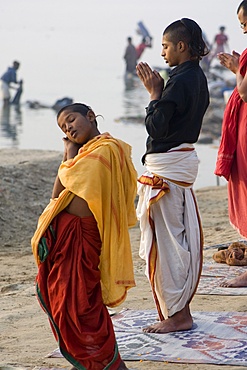 Student of a Sanskrit school sleeping during the morning prayer, Varanasi, Uttar Pradesh, India, Asia