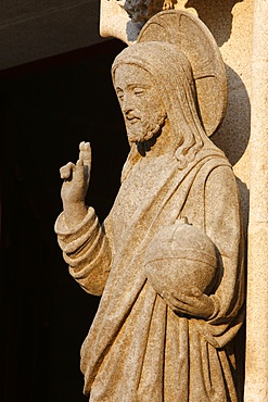 Western gate sculpture of the risen Christ holding the world, Saint-Corentin Cathedral, Quimper, Finistere, Brittany, France, Europe