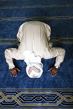 Muslim man praying, Dubai, United Arab Emirates, Middle East