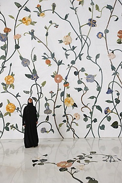 Thousands of semi-precious stones, inset in marble, in a flower pattern decorate the Sheikh Zayed Grand Mosque, Abu Dhabi, United Arab Emirates, Middle East