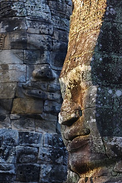 Stone faces, which may depict Jayavarman VII as a Bodhisattva, on towers in the Bayon Temple, Angkor Thom, Angkor, UNESCO World Heritage Site, Siem Reap, Cambodia, Indochina, Southeast Asia, Asia