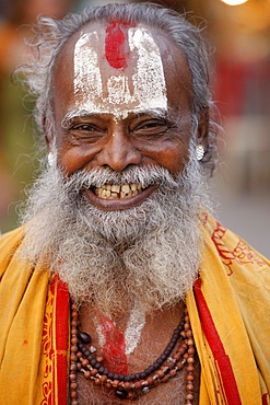 Smiling sadhu with Vishnu mark on his forehead, Rishikesh, Uttarakhand, India, Asia