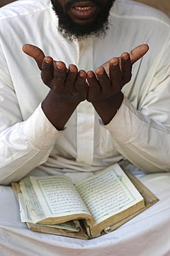 African man reading the Quran, Bamako, Mali, West Africa, Africa