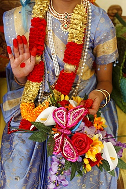 Girl impersonating Hindu goddess Radha (Krishna's consort) at Janmashtami festival at Bhaktivedanta Manor ISKCON (Hare Krishna) temple, Watford, Hertfordshire, England, United Kingdom, Europe