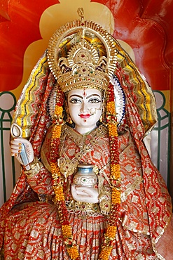 Statue of the Hindu goddess Annapurna (Parvati) giving food, Lakshman temple, Rishikesh, Uttarakhand, India, Asia