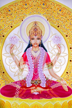 Picture of Lakshmi, goddess of wealth and consort of Lord Vishnu, sitting holding lotus flowers, Haridwar, Uttarakhand, India, Asia