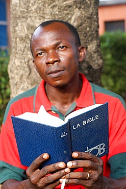 Man reading the Bible, Lome, Togo, West Africa, Africa