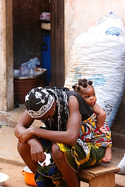 African woman carrying her baby on her back, Lome, Togo, West Africa, Africa