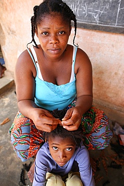 Hairdresser at home, Lome, Togo, West Africa, Africa