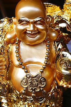 Statue of Ong Dia, the round happy God of the Earth who symbolizes prosperity, Paris, France, Europe