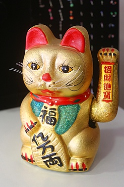 The Maneki-neko (Welcoming Cat) (Lucky Cat) (Money Cat) (Fortune Cat), a Chinese symbol in Seine-et-Marne, France, Europe