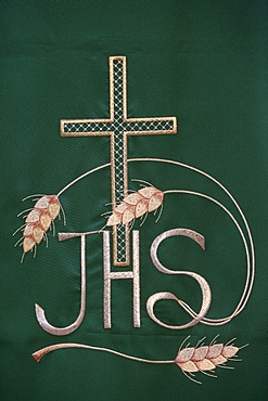 Jesus Christ Christogram or monogram in embroidery in Maria SS. Assunta church, Galatone, Lecce, Apulia, Italy, Europe