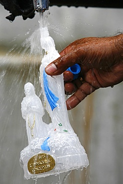 Holy water tap at the Lourdes shrine, Lourdes, Hautes Pyrenees, France, Europe