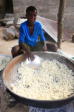 Drying the cassava in the African village of Datcha, Togo, West Africa, Africa