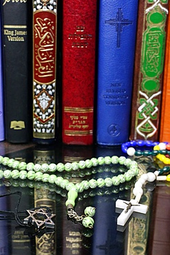 Bibles and Quran, interfaith symbols of Christianity, Islam and Judaism, the three monotheistic religions, Haute-Savoie, France, Europe