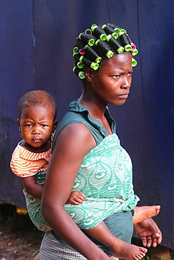 African baby carried on the back of his mother, Togo, West Africa, Africa