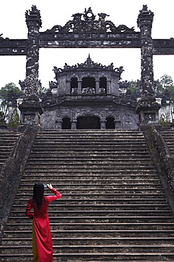 Vietnamese schoolgirl taking picture of Khai Dinh's Tomb, Hue, Vietnam, Indochina, Southeast Asia, Asia