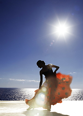 Flamenco dancing by sea in full sunlight, Ibiza, Spain, Europe