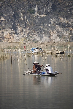 Women fishing in river from boat, Vietnam, Indochina, Southeast Asia, Asia