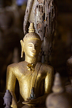 The Tham Ting spiritual caverns at the Pak Ou caves site, on the Mekong River, with many Buddha sculptures, north of Luang Prabang, Laos, Indochina, Southeast Asia, Asia