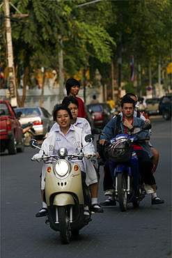 Some Thai kids on the Chiang Mai road,Thailand, Southeast Asia, Asia