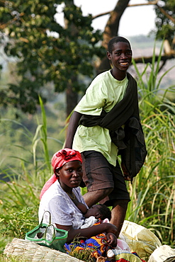 A mother and her family near Ndali, in the region of the Queen Elizabeth National Park, Uganda, East Africa, Africa