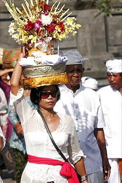 Woman going down the stairs of the temple of Besakih, Bali, Indonesia, Southeast Asia, Asia