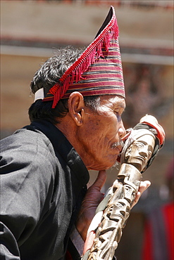 Man at a Batak dance show in Samosir, Lake Toba, Sumatra, Indonesia, Southeast Asia, Asia