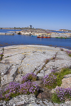 Canoeing along the coast of the Kobba Klintar island in the Aland archipelago, Finland, Scandinavia, Europe