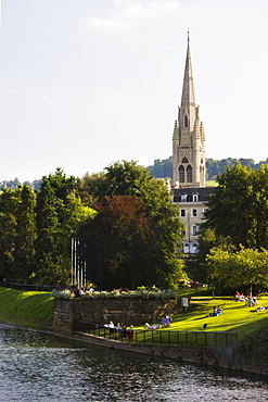 View down the River Avon from Pulteney Bridge, showing Parade Gardens and the bridge over North Parade, Bath, Avon, England, United Kingdom, Europe