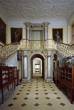 View of the staircase in the Great Hall looking through to the Lobby and Dining Parlour, Audley End, Essex, England, United Kingdom, Europe