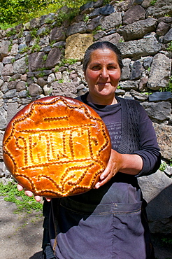 Woman selling traditional sweets, Geghard Monastery, Armenia, Caucasus, Central Asia, Asia